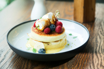 Pancakes with berries and marshmallow