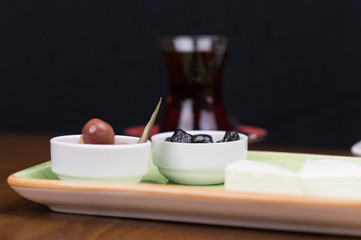 at breakfast, cucumber tomato cheese olive tray