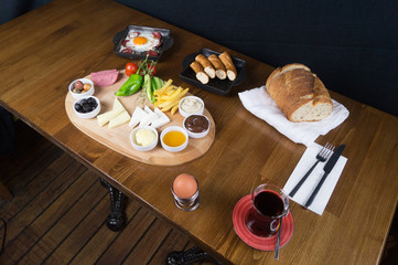 at breakfast, cucumber tomato cheese olive tray