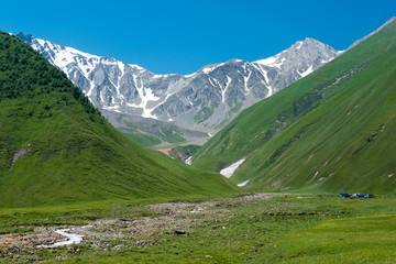 Fototapeta na wymiar Kazbegi, Georgia - Jul 01 2018: Truso valley near Caucasus mountain. a famous landscape in Kazbegi, Mtskheta-Mtianeti, Georgia.