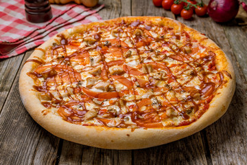 Pizza with meat and barbecue sauce