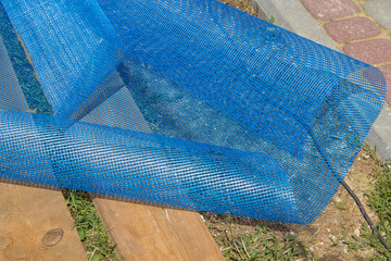 a piece of mesh of the facade,The grid remains for the facade are on the boards