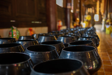 many alms bowl in the Thai temple