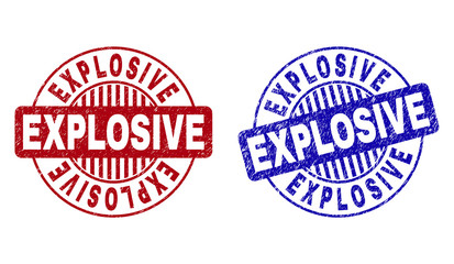 Grunge EXPLOSIVE round stamp seals isolated on a white background. Round seals with grunge texture in red and blue colors. Vector rubber imprint of EXPLOSIVE text inside circle form with stripes.