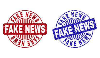 Grunge FAKE NEWS round stamp seals isolated on a white background. Round seals with grunge texture in red and blue colors. Vector rubber overlay of FAKE NEWS tag inside circle form with stripes.