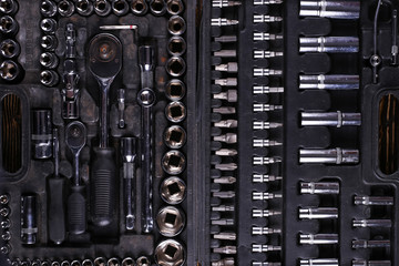 A set of tools in the box, organized workspace.