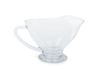 Empty glass sauce boat on a white background