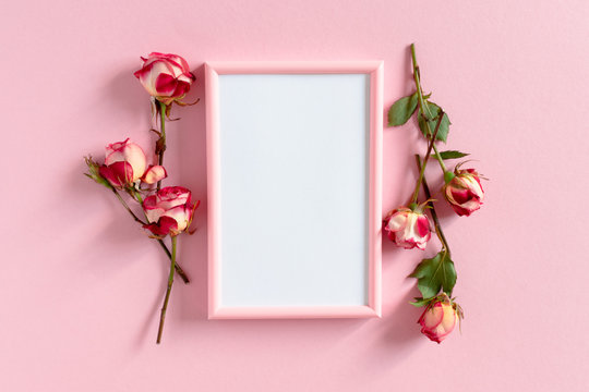 Photo frame mockup and roses