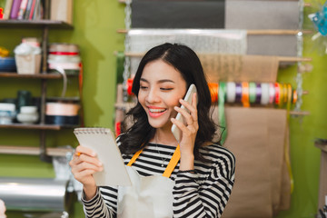 Business of flower shop with woman owner