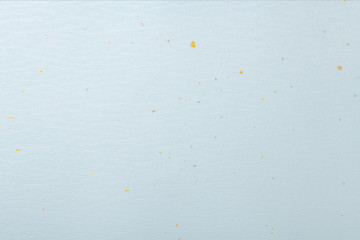 箔を散らした水色の紙