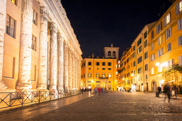 Fototapeta na wymiar Columns of Hadrian Temple at Piazza Di Pietra in Rome, Italy