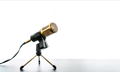 microphone on table against bright white background