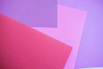 Abstraction of a design pink paper. Empty space on monochrome paper.