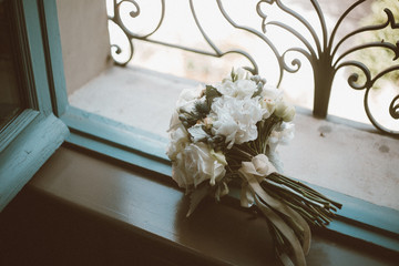 bridal bouquet on a window