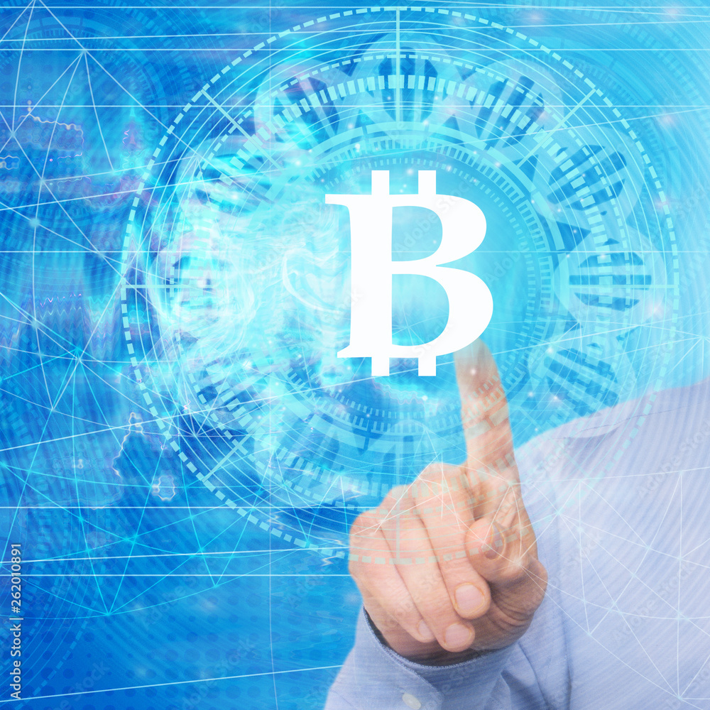 Aufkleber a man's hand using a bitcoin icon on a virtual display, on a technological background, using a netwo