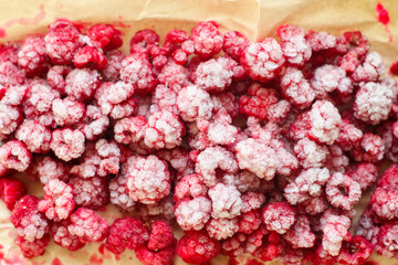 Frozen raspberries background / preserving raspberries
