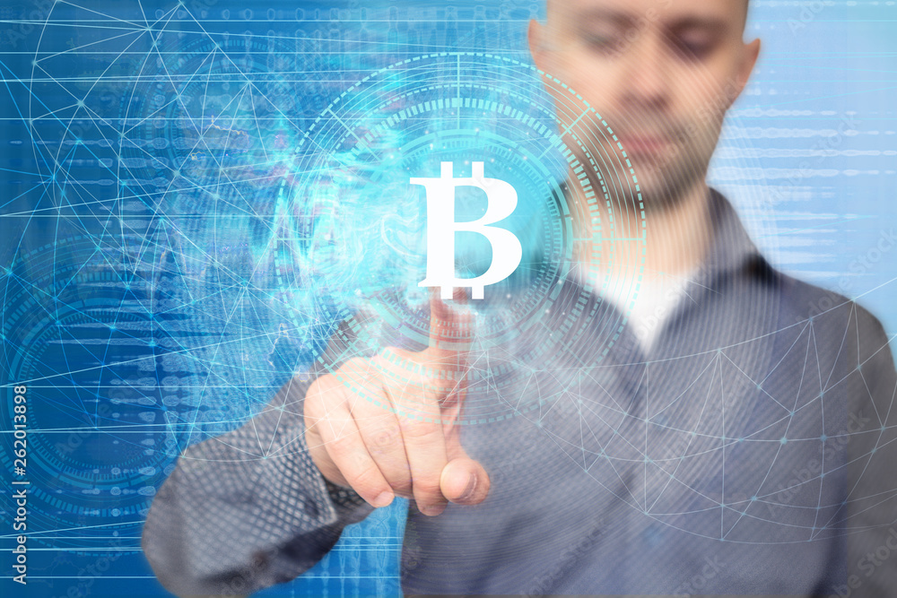 Fototapete using a bitcoin icon on a virtual display, on a technological background, using a network interface,