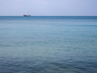 Motor boat on the surface of the sea near the island. Koh Phangan. Thailand