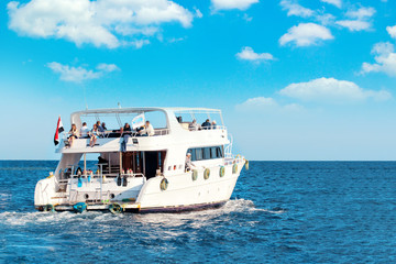 Fototapeta na wymiar pleasure yacht anchored off the coast of the Egypt. Hot sunny day