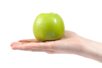 Ripe delicious juicy green apple in hand isolated on white background. Healthy eating and dieting concept