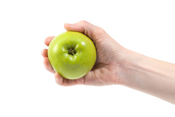 Ripe delicious juicy green apple in hand isolated on white background. Healthy eating and dieting...