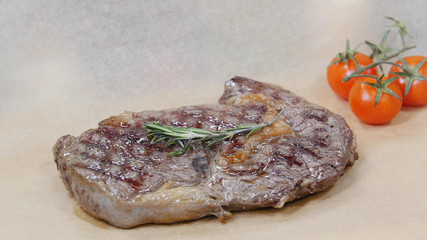 Restaurant kitchen. Fried piece of meat. Steak.