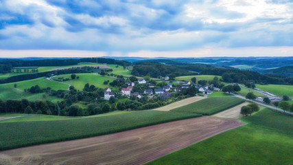 Fototapeta na wymiar Aerial view of Schemmerhausen, a small village in the county of Reichshof in Germany.