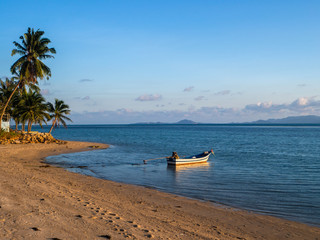 Motor boat on the surface of the sea near the island. Koh Phangan. Thailand