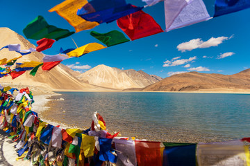Mountains and Pangong tso (Lake). It is huge and highest lake in Ladakh and blue sky in background,