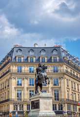 Fototapeta na wymiar Equestrian statue of King Louis XIV at Place de Victoires (Victory Square) comissioned by King Louis XVIII to Francois Joseph Bosio.