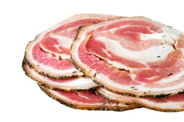 Tasty sliced pork bacon, meat, lard, jamon, prosciutto isolated on white background.