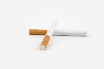 Two cigars isolated on white background. Filtered cigarettes.