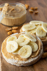 Peanut butter and banana on rice cakes, healthy, dietary food.