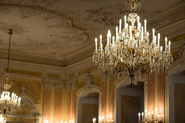Chrystal chandelier in a splendid baroque room