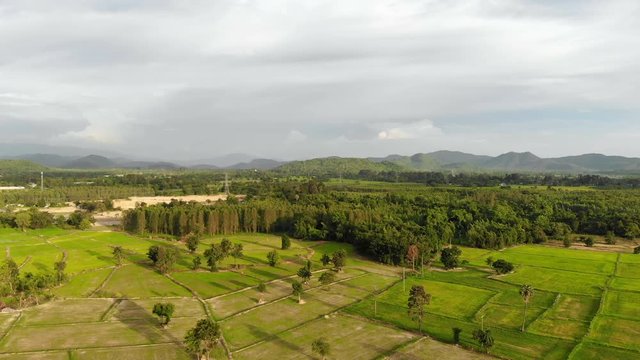 Drone shot aerial view scenic landscape of agriculture farm at countryside