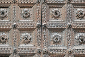 Parma Baptistery wooden gate detail. Color image