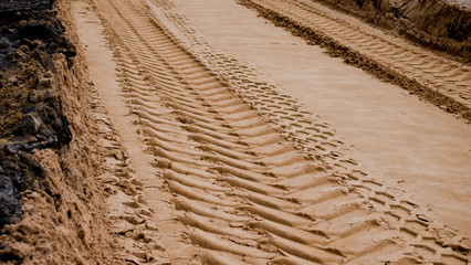 tire tracks in the sand
