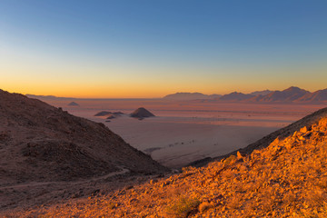 Fototapeta na wymiar Sunset in the Namib Desert