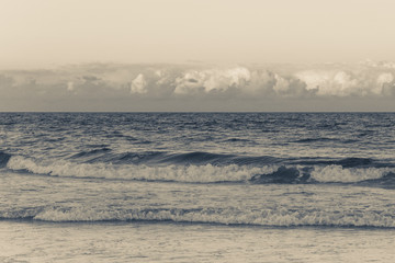 Ocean waves and clouds at sunset in Palm Beach Florida