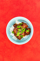 Asian style caramel pork with rice and vegetable