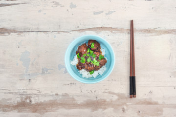 Asian style caramel pork with rice and vegetable