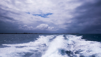 Boat-ride in the Ocean during a cloudy day near Nassau in The Bahamas.