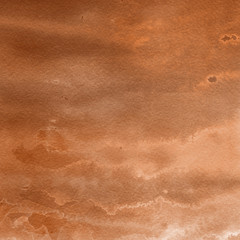 Orange with brown ink and watercolor textures on white paper background. Paint leaks and ombre effects. Hand painted abstract image.