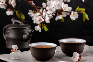 Chinese brown teapot and cups for tea