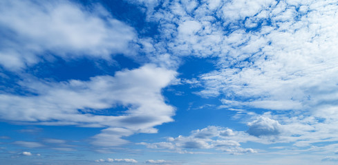 Fototapeta premium Blue sky with white clouds. Blue sky background with clouds.