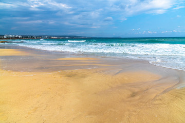 Fototapeta na wymiar Beautiful sandy beach on the island of Cyprus