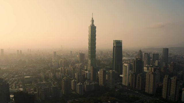 4k Aerial drone footage - Skyline of the city of Taipei, Taiwan at sunset.  