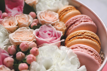Beautiful floral background in the Box with the macaroons on top of the background