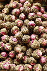 Fototapeta na wymiar dried green tea with rose buds