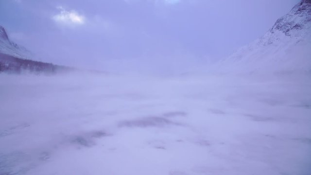 High winds over a frozen river in national park Sarek. Lapland, Sweden.